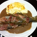 Bacon-wrapped trout with onion compote (Epicurious)