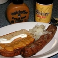 Brats Braised with Beer and Onions