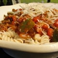 BRATS in Red Sauce over Pasta