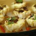 CARAMELIZED ONION AND GOAT CHEESE TARTLETS