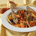 Chorizo & Clam Stuffed Pasta Shells in Cioppino Sauce