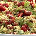 Couscous with grilled cherry tomatoes and fresh herbs