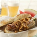 Grilled Bratwurst with Onions Braised in Beer and Mustard