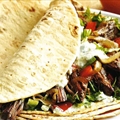 Gyro Beef Brisket Sandwich with Lemon-Feta Tzatziki