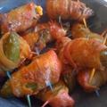 Jalapenos stuffed w/ crab and smoked cheddar, wrapped in bacon