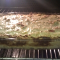 Leek and shallots tart in a bed of emmental