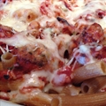 Pasta Baked with Sausage, Tomatoes and Cheese