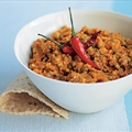 Red split lentils cooked in a pan