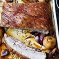 Roast pork belly with juniper and apples