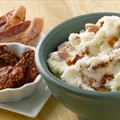 Smashed Potatoes with roasted onions and sun-dried tomatoes