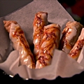 Sweet pastry cigars with almond and cinnamon filling