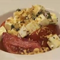 Tomato salad with marinated cheese