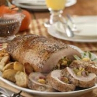 Apple and Cornbread-Stuffed Pork Loin with Roasted Apple Gravy