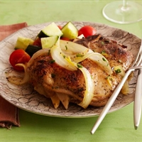 Apple and Onion-Stuffed Pork Chops with Orange-Pineapple Gravy