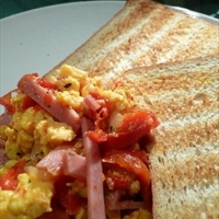 Basque Eggs With Ham, Tomatoes And Peppers