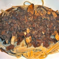 Blackened Chicken Strips on Pasta W/cajun Sauce