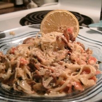 Capelli d'Angelo with creamy tomato, coriander and prosciutto sauce