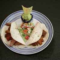 Carnitas De Puercos Con Guacamole Y Pico De Gallo