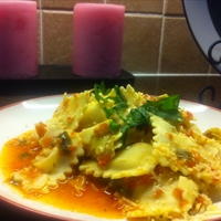 Cheese Ravioli with Fresh Tomato and Artichoke Sauce Cheese Ravioli with Fresh Tomato and Artichoke Sauce