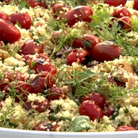 Couscous with grilled cherry tomatoes and fresh herbs