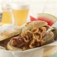 Grilled Bratwurst with Onions Braised in Beer and Mustard