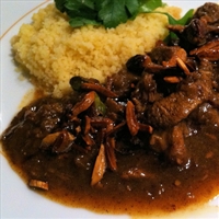 Lamb tagine with dates, almonds and pistachios