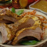 Latin Pork Back Ribs with Smoky Pineapple-Mango Sauce