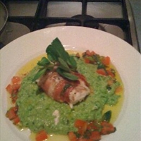Monkfish rapped in Parma Ham served with pea & mint puree Monkfish rapped in Parma Ham served with pea & mint puree