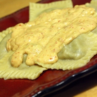 Mushroom Mascarpone Ravioli with Sundried Tomato Alfredo Sauce