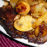 New York Strip Steak with Brandied Mushrooms and Fresh Thyme
