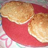 Pancakes in Strawberry Sauce