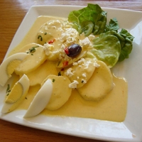 Papas a la Huancaina (Potatoes W/cheese and Chili Sauce)