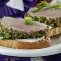Pistachio-Crusted Pork Tenderloin Bruschetta