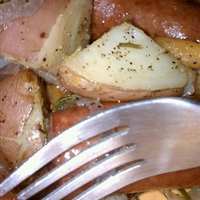 Rosemary and pepper sausages with potatoes