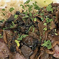 Seared and Carved Beef Tenderloin with Herb Quinoa, Poached Leeks and Wild 