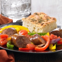 Spicy Sausage and Peppers Over Rice