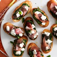 Spinach-Mint Pesto Toasts With Proscuitto and Goat Cheese