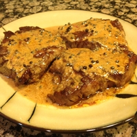 Steak with Creamy Peppercorn Sauce