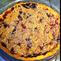 Strawberry and blueberry pie with crumble topping