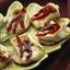 Alouette Baby Brie Topped Potato Slices Alouette Baby Brie Topped Potato Slices