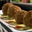 Bacon and Potato Fritters with Spiced Honey Sour Cream Dipping Sauce