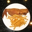 Fried Fish, Tartar Sauce, French Fries and Hushpuppies Fried Fish, Tartar Sauce, French Fries and Hushpuppies
