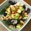 Kale salad with Parmesan, avocado, cannelini beans and pine nuts