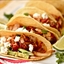 Pork Tinga with Potatoes, Avocado and Fresh Cheese