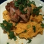 Salsa chicken on carrot couscous