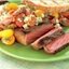 Strip Steaks with Tomato and Blue Cheese Vinaigrette Strip Steaks with Tomato and Blue Cheese Vinaigrette